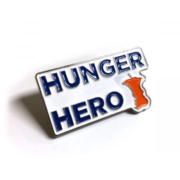 2023-05-24-totn-enamel-pin-hunger-hero-tiltview-IMG_1330